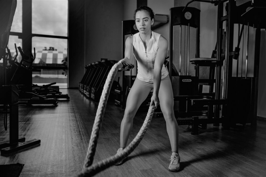 Female Performing Battle Rope Exercise